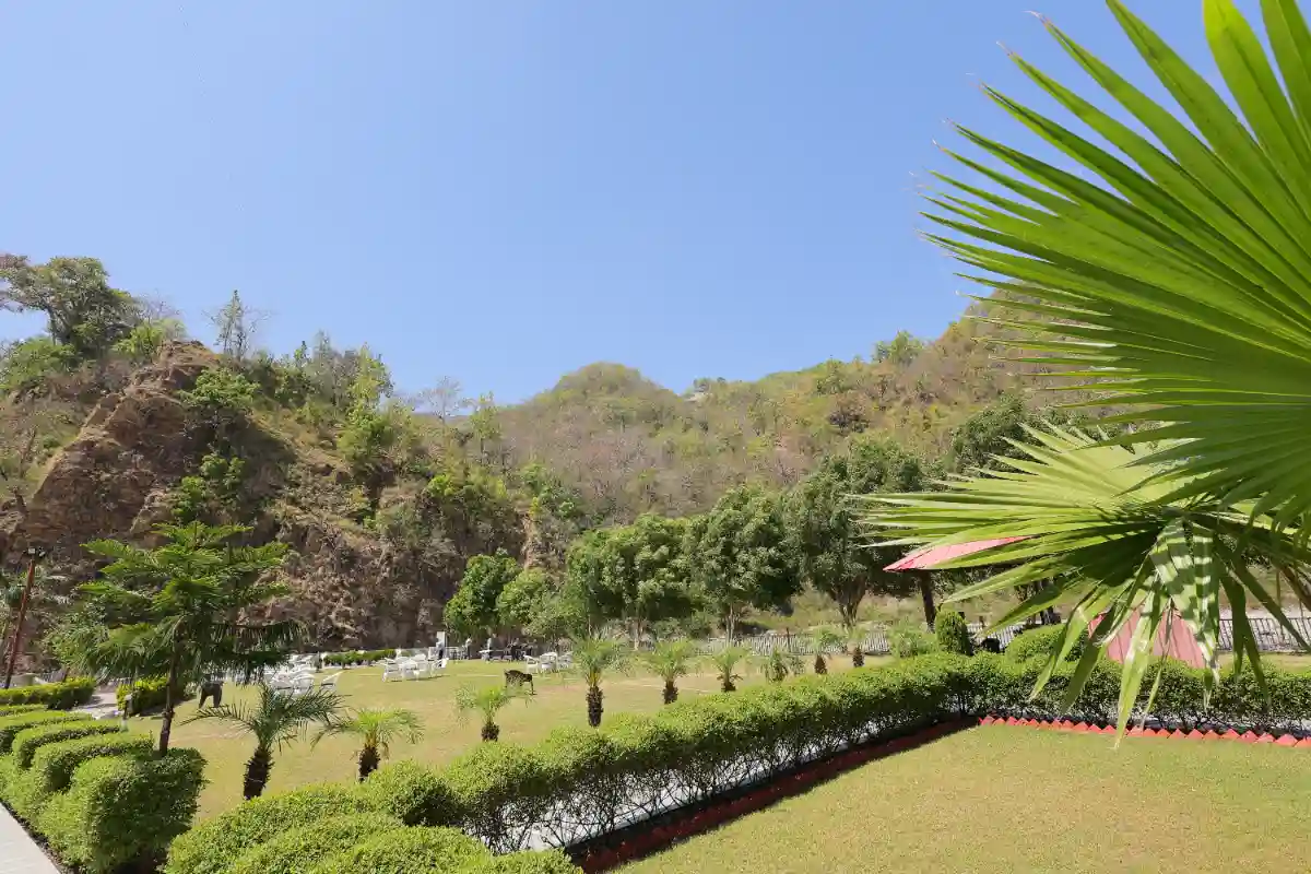 Grand swimming pool at Nirvana River Resort - best resort with pool in Rishikesh