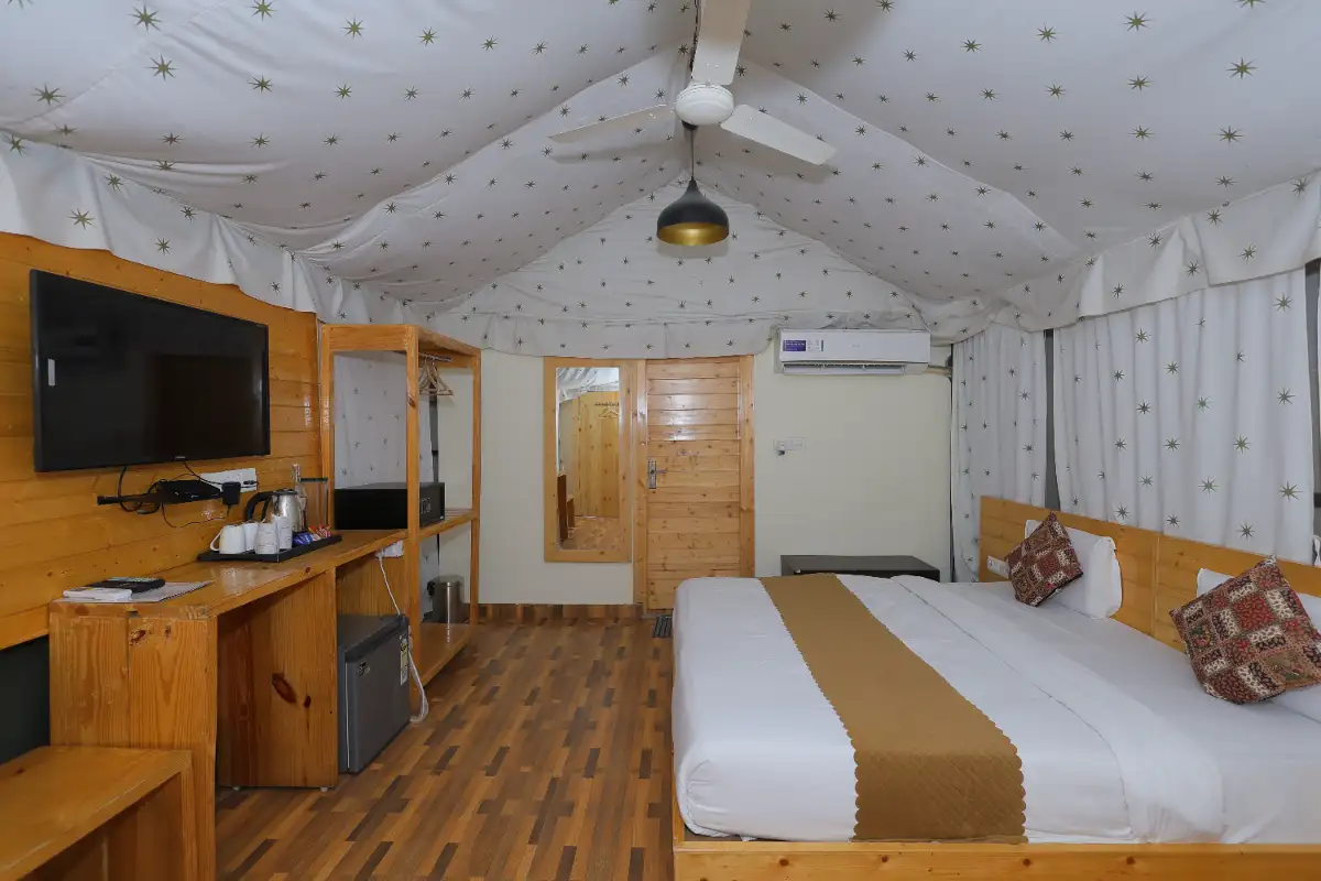 Swiss Cottage at Nirvana River Resort Rishikesh - luxury AC camping cottage on Ganges riverbank
